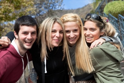 group of happy smiling youth